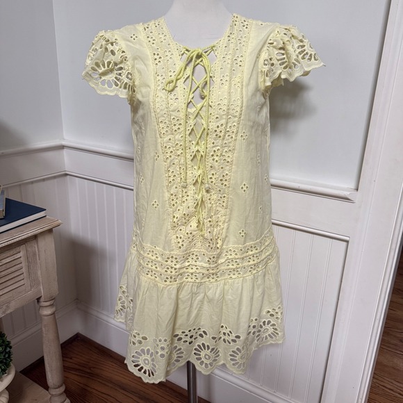Free People Dresses & Skirts - NWT Free People Eyelet Lace Mini Dress Pale Yellow Lace Up Open Back XS